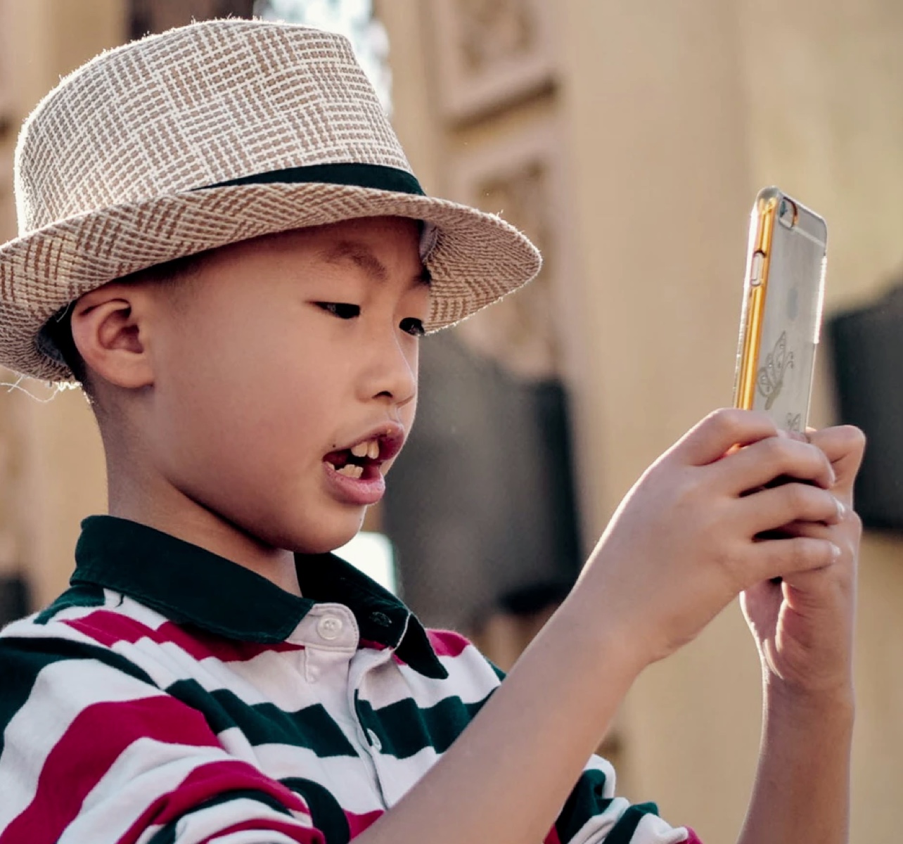 Image of child using phone